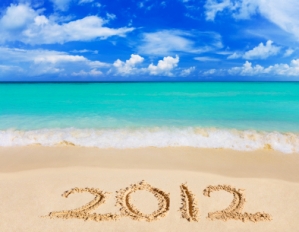 Numbers 2012 written in the sand on a beach