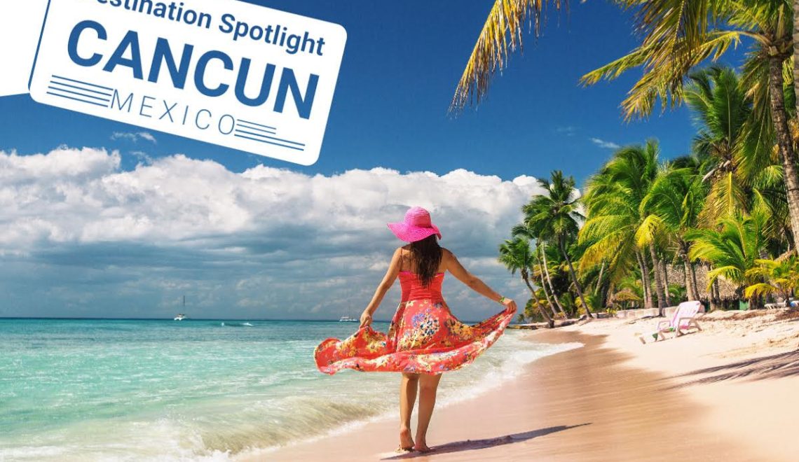 Woman standing on beach in Cancun, Mexico - Destination Spotlight Cancun