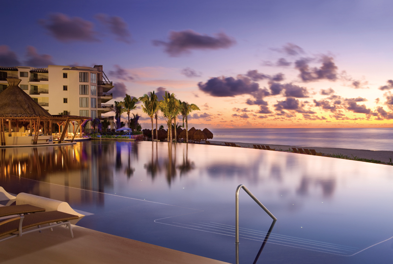 Dreams Riviera Cancun Resort & Spa Infinity Pool at Dusk