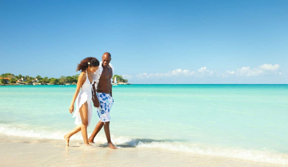 Couple Walking on the Beach in the Caribbean