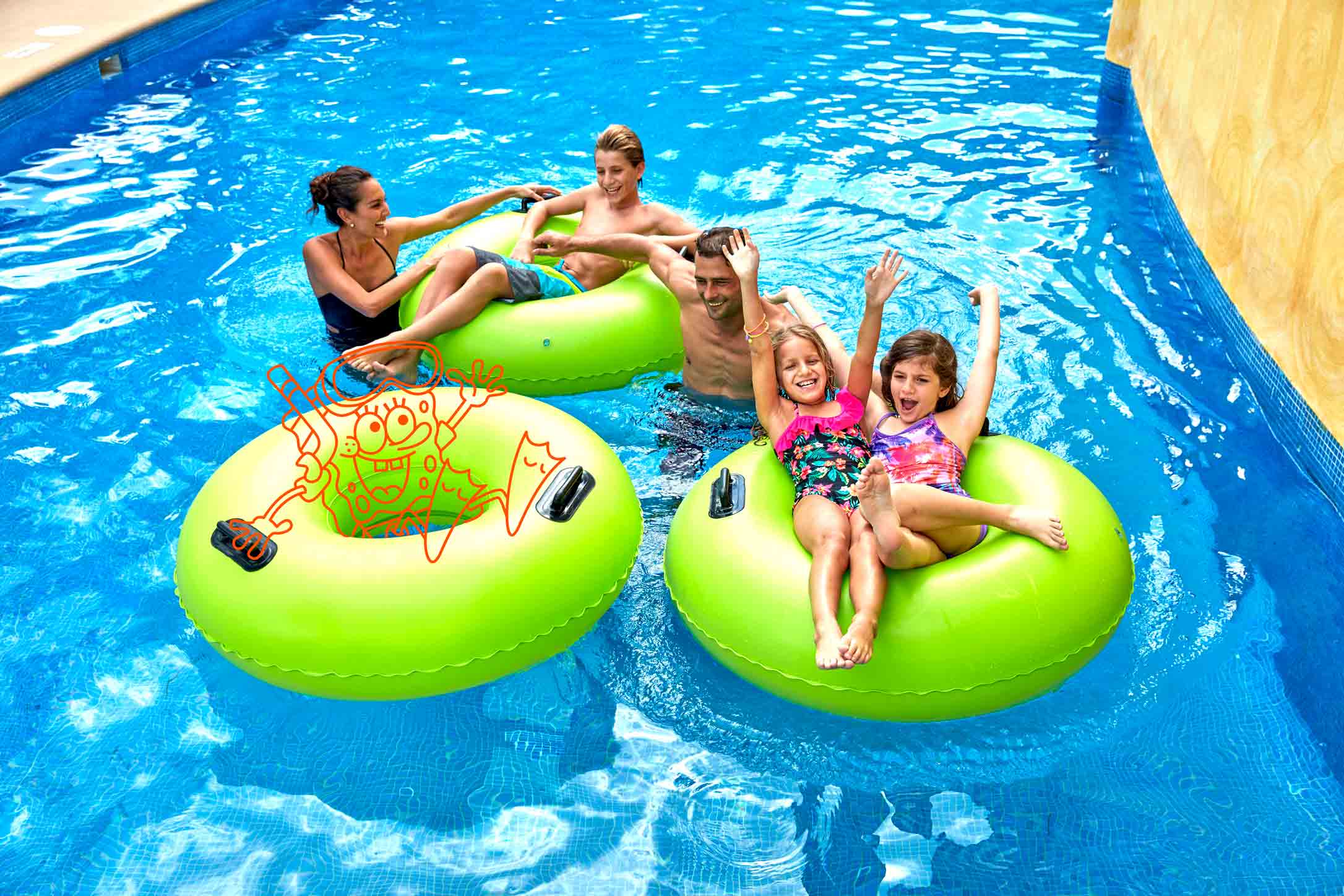 Family floating down lazy river with image of spongebob squarepants