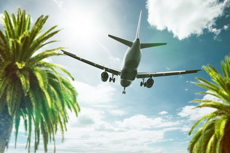 Plane flying in the Caribbean